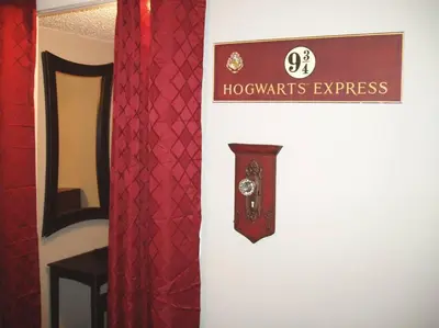 a sign that reads hogwarts express next to red curtains at HARRY POTTER LIVES HERE! Unforgettable Home, Pool, Sleeps 8, Near Dis, LOW Rates! in Kissimmee