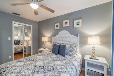 a bedroom with a bed and a ceiling fan at FABULOUS New Decor, Near Dis, Fireplace, Star Wars Children's BR, Next To Pool, LOW rates! in Kissimmee