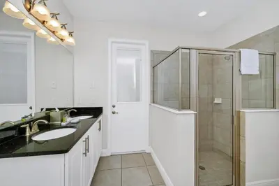 a bathroom with a shower and a sink at Spacious Home With Private Pool Near Disney With Waterpark & Resort Access At Encore Resort - 7720Ff in Kissimmee