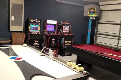 a gaming room with a pool table and a basketball at Disney Villa Magical Retreat Private Pool, LakeView & Game Room in Kissimmee