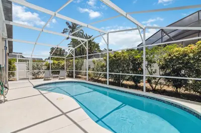 a swimming pool in the middle of a building at Indian Ridge- 4 bedroom home with Game Room in Orlando
