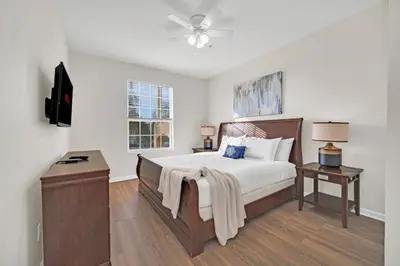a bedroom with a bed and a television in it at Star Wars Themed Home at Windsor Palms in Kissimmee