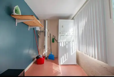 a kitchen with a white refrigerator and a door at Orlando 3BR2BA Family Stay with Big Savings in Orlando
