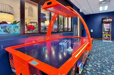 an indoor pool in a store with an orange at Trendy Retreat - Great Location - Fully Loaded in Kissimmee