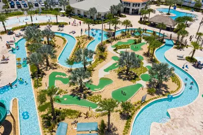 an aerial view of a water park at a resort at Premium 6BR home w/Pool-BBQ just 10min to Disney in Kissimmee