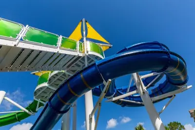 a blue water slide at a theme park at Summer Dreams 3 Bed Condo in Windsor Hills condo in Orlando