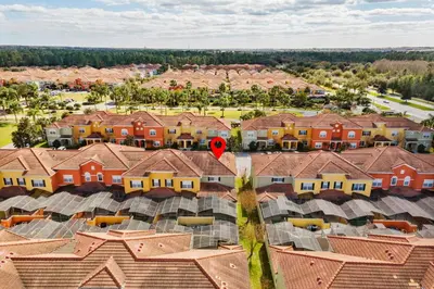 an overhead view of a suburb with a red heart at 8965 Cozy home Private Pool in Kissimmee