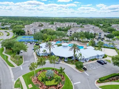 an aerial view of a resort with a parking lot at 8102-IBRAHIM · 8102 Vacation getaway at Windsor in Kissimmee