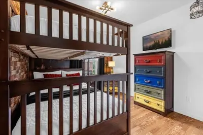 a loft bed in a bedroom with a tv at 3 Bed 2,5 Bath Perfect Family home Bunk Beds townhouse in Kissimmee