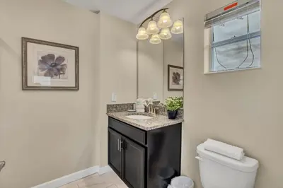 a bathroom with a sink and a toilet at 3097Pequod townhouse in Kissimmee