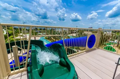 a water slide on the balcony of a resort at Storey Lake 6 bed Home- King Master on 1st Floor villa in Kissimmee