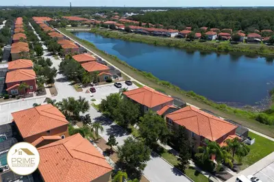 an aerial view of a resort with a river at Amazing 6bd Resort Home Pool & Near Disney in Kissimmee