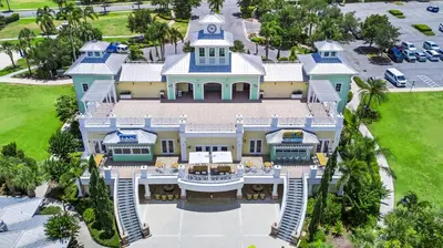 an aerial view of a large house with a blue roof at Inviting Home Near Disney With Waterpark & Resort Access At Encore Resort - 7792Sw in Kissimmee