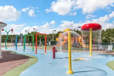 a water park with a fire hydrant and a fountain at 4 Bedroom 3 Bathroom Villas At Seven Dwarfs 10-102 in Kissimmee