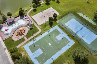 an overhead view of two tennis courts on a field at 4 Bedroom 3 Bathroom Villas At Seven Dwarfs 8-108 in Kissimmee