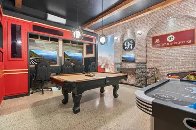 a billiard room with a pool table in the middle of it at Brand NEW 12Bedrooms12Bathroom At Paradiso Grande in Orlando