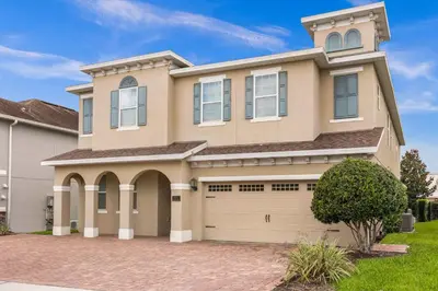 a large house with a garage at Your Dream Vacation Awaits Family 10-Bd Villa in Orlando
