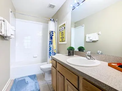 a bathroom with a sink and a toilet at WH7742CS - Newly renovated villa in Windsor Hills in Orlando