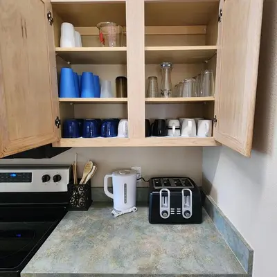 a kitchen with a counter with a toaster and a blender at 4 Bedroom villa in Lake Berkley, Private Pool Fantastic View, Free WiFi, Theme Parks All Around! in Kissimmee