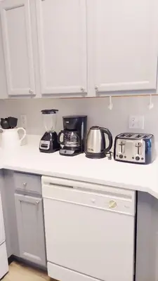a kitchen counter with pots and pans on it at New Listing Just remodeled 4 BR - ER2739 in Kissimmee
