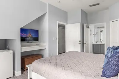 a white bedroom with a bed and a sink at New Listing Just remodeled 4 BR - ER2739 in Kissimmee