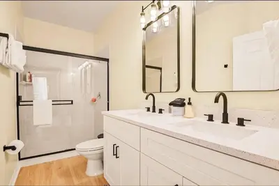 a bathroom with a sink and a toilet and a shower at Disney Paradise-Family Friendly- Near to Disney in Orlando