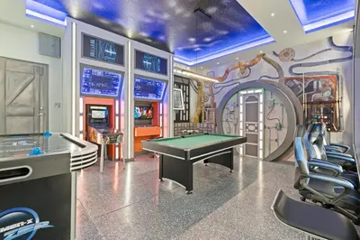 a gaming room with a pool table and a game room at Brand NEW 12Bed12Bath At Paradiso Grande in Orlando