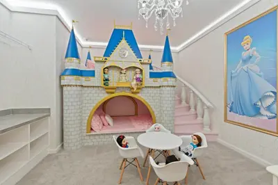 a childs room with a disney castle wall mural at Brand NEW 12Bed12Bath At Paradiso Grande in Orlando