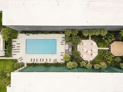 an overhead view of a building with a pool at Peaceful Haven 1BR Next to Disney Parks in Orlando in Kissimmee