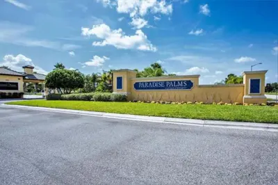 a building with a sign that reads independence palms at Orlando Area Vacation Rental with private pool in Kissimmee