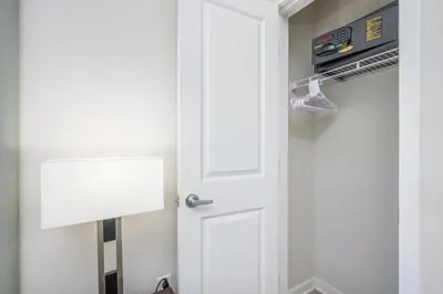 a door leading into a room with a dvd player at Epic Universe Brand New Modern Vista Cay Reserve Condo - 6005 in Orlando
