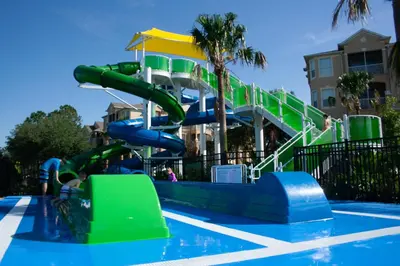 a water slide in a pool with a water park at 2533 Renshaw Street in Orlando