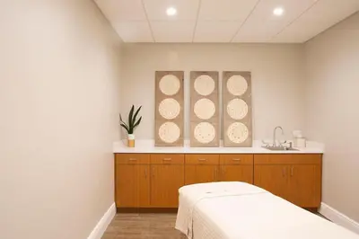 a hospital room with a bed and a sink at Enjoy your AM coffee in resort relaxation garden in this great 1BD condo in Orlando in Orlando