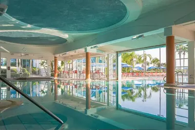 a swimming pool with a view of a resort at Take the Family to Orlando in this great 2BD in a resort setting with tons of amenities in Orlando