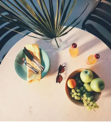 a table with a bowl of fruit on it at Enjoy Orlando Family Getaway in 2BD condo with lots of onsite activities in Orlando