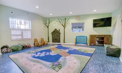 a living room with a large rug on the floor at Beautiful Hotel of Cypress Palms 2BD in Kissimmee
