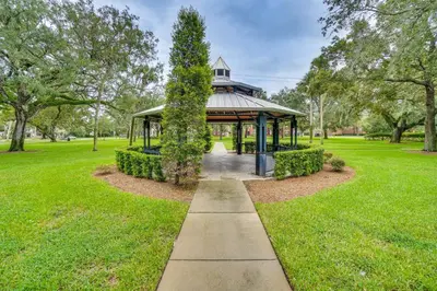 a gazebo in the middle of a park at Half-Mi to Riverwalk Charming Sanford Retreat! in Sanford