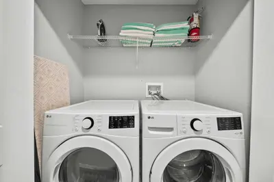 a laundry room with a washer and dryer at 5003 Windermere Avenue in Kissimmee