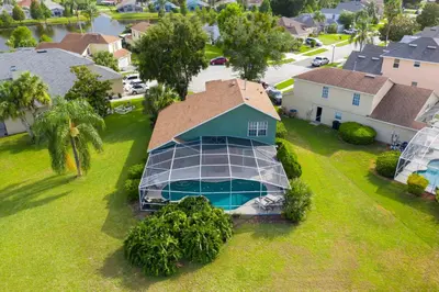 an aerial view of a house with a swimming pool at Celebrate BR in Orlando