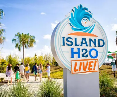 a sign for island hogan live at a beach at Sea Shell Blue Cottage Near Disney With Private Pool And Margaritaville Resort & Island H2O Access - 8039Kd in Orlando