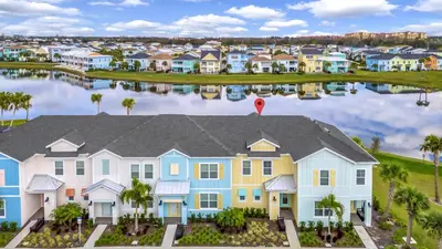an aerial view of a row of houses at Flip Flops & Fairytales Waterfront With Margaritaville Resort & Island H2O & Island H2O Access - 3021Cs in Orlando