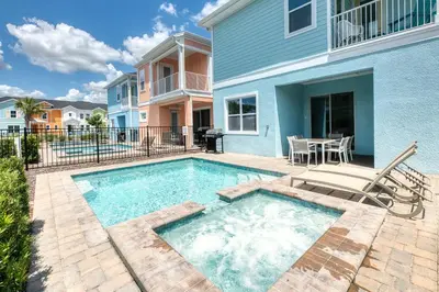 a swimming pool in front of a house at Dreamy Cottage With Private Pool Near Disney And Margaritaville Resort & Island H2O Amenities - 8019Kd in Orlando