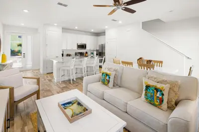 a living room with a couch and a table at Lovely Villa Near Disney With Margaritaville Resort & Island H20 Access - 8201Su in Orlando