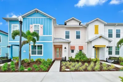 a house with blue and white at Perfect Family Villa Near Disney With Margaritaville Resort & Island H20 Waterpark Access - 3168Cs in Orlando