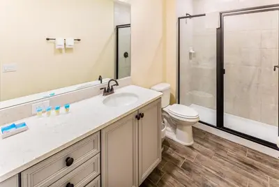 a bathroom with a sink and a toilet at Breezy Villa Near Disney With Margaritaville Resort & Island H20 Access - 8177Su in Orlando