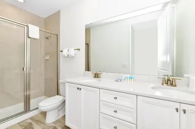 a bathroom with a sink and a toilet and a shower at Cozy Villa Near Disney With Margaritaville Resort And Island H20 Waterpark Access - 2907Cl in Orlando