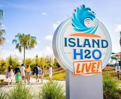 a sign for island hogan live at a beach at Comfy And Delightful Villa Near Disney With Margaritaville Resort & Island H20 Access - 8185Su in Orlando