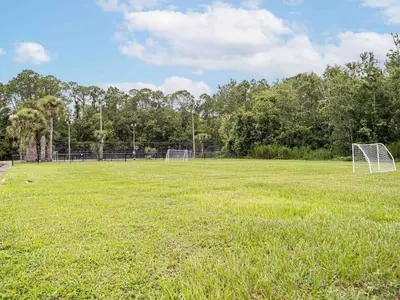 an empty soccer field with a goal at Elegant 1BR Haven in Orlando & 5 minutes to Disney in Vineland