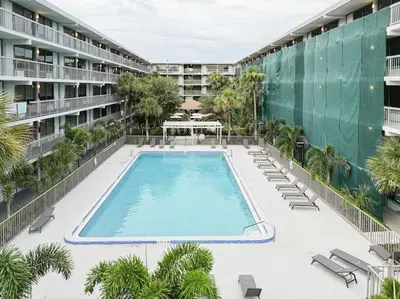 an empty swimming pool in the middle of a building at Orlando Prime Location 1BR Home 5 minutes to Disney in Kissimmee
