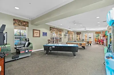 a games room with a pool table and other games at 3BR Disney Getaway, Pool, Waterslides, By Disney in Orlando